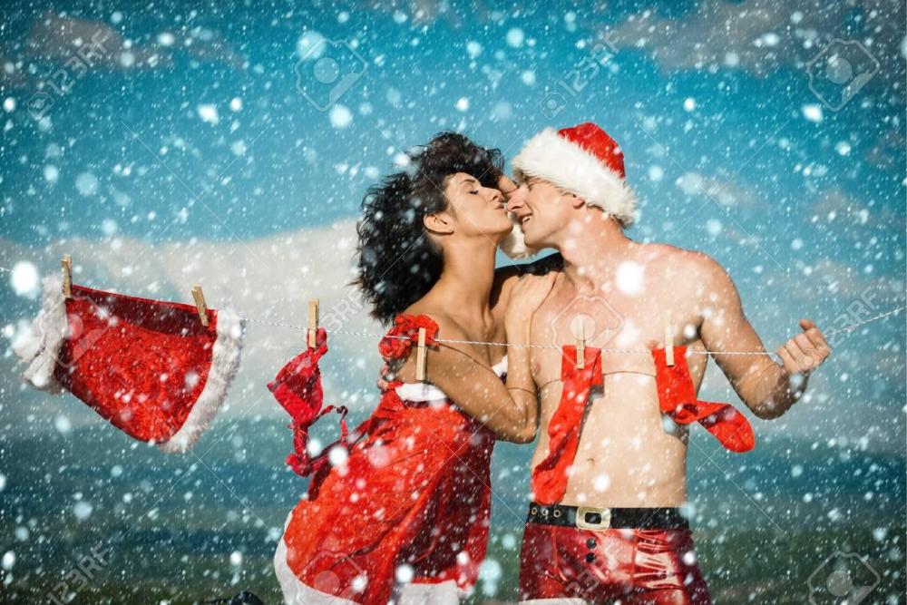 91609163-new-year-christmas-snow-concept-xmas-red-costume-on-rope-with-pin-laundry-and-dry-cleaning-couple-of.jpg